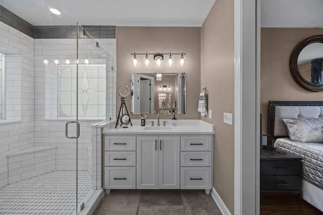 bathroom with tile patterned floors, a shower with door, and vanity