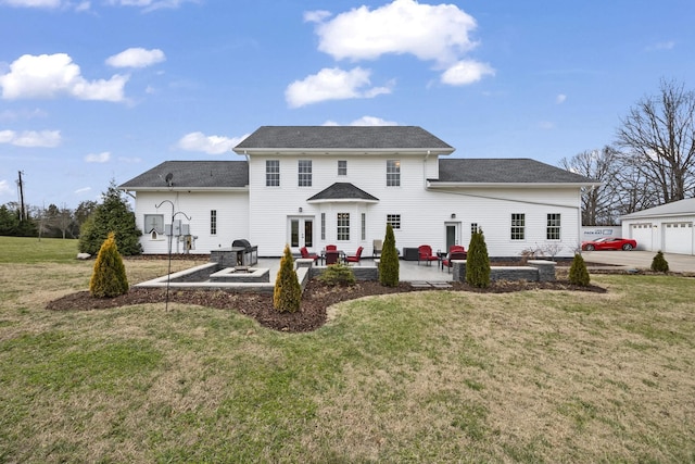 back of house with a lawn and a patio