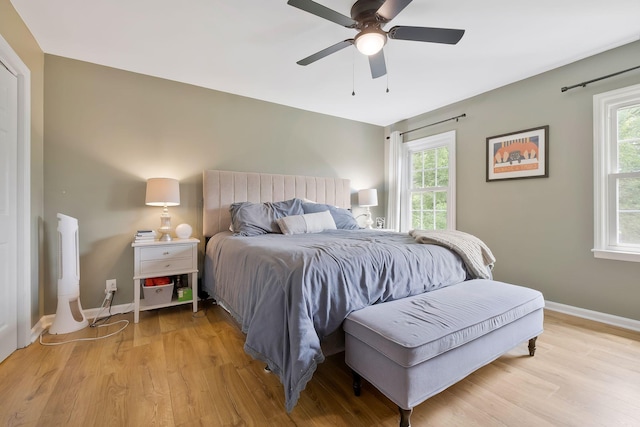 bedroom featuring ceiling fan and light hardwood / wood-style flooring