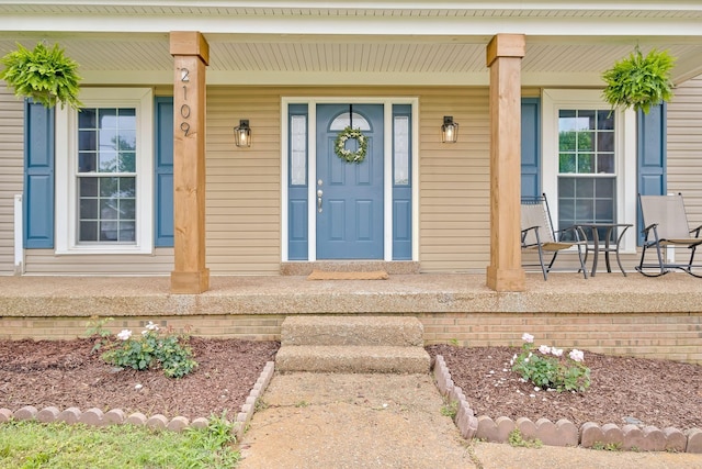 entrance to property with covered porch