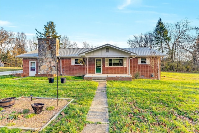 ranch-style home featuring a front yard