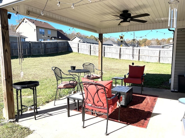 view of patio featuring ceiling fan