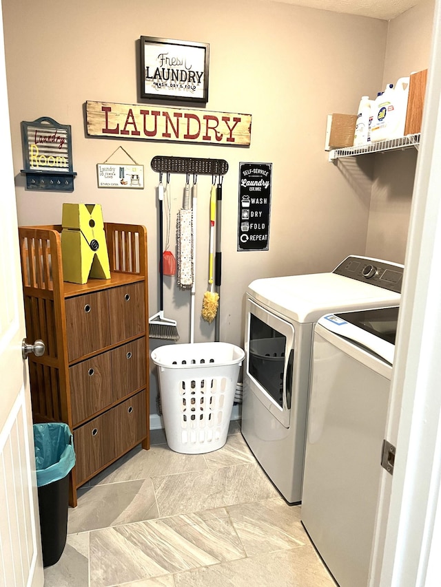 laundry room with independent washer and dryer