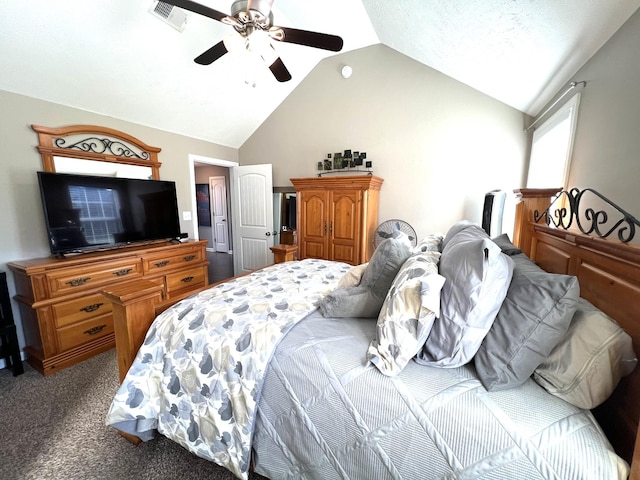 bedroom with carpet flooring, ceiling fan, and vaulted ceiling