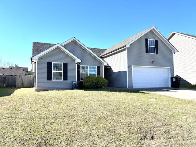 front of property featuring a garage and a front lawn