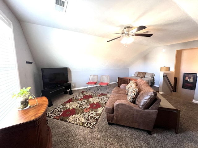 living room with carpet, ceiling fan, and vaulted ceiling