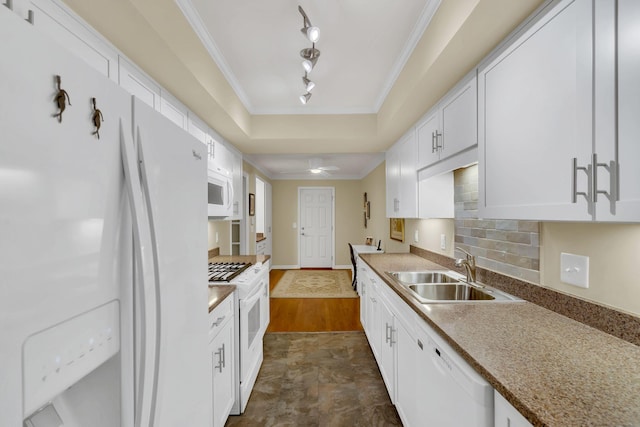 kitchen featuring white cabinets, white appliances, sink, and ornamental molding