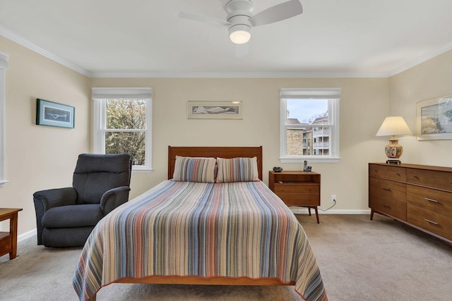 carpeted bedroom featuring ceiling fan, crown molding, and multiple windows