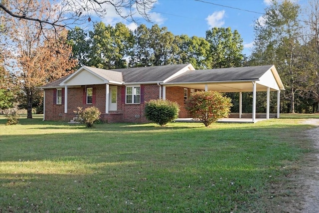 single story home featuring a carport and a front lawn