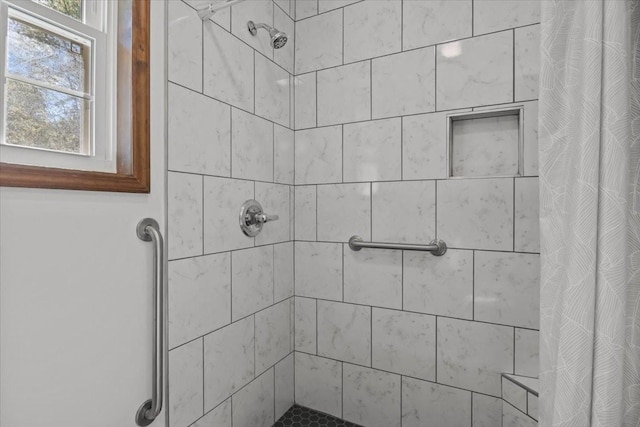 bathroom with a shower with curtain