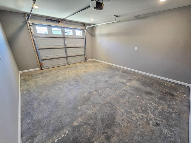 garage featuring a garage door opener