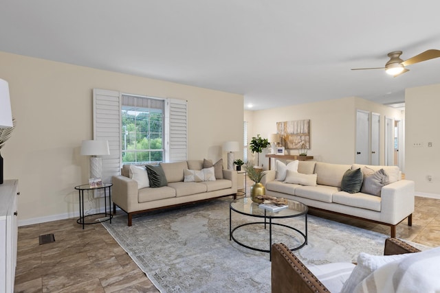 living room with ceiling fan