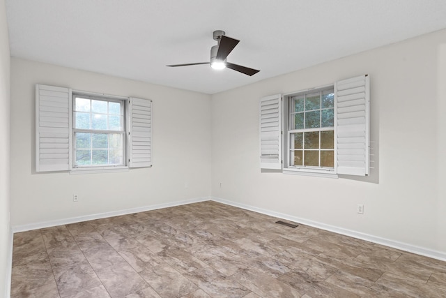 empty room with ceiling fan