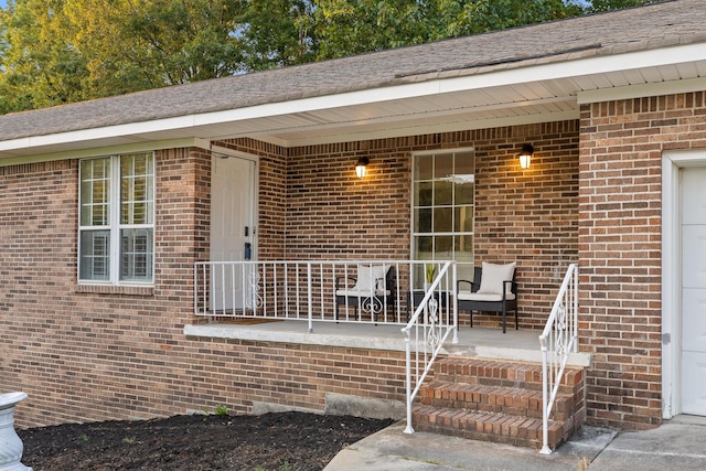 doorway to property featuring a porch