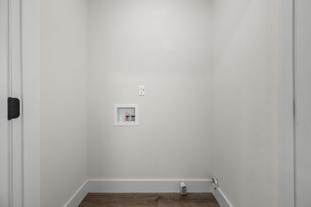 laundry room featuring hookup for a washing machine and hardwood / wood-style flooring