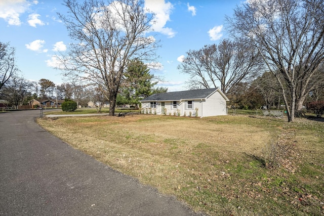 view of front of house with a front lawn