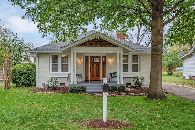 view of front of home with a front yard