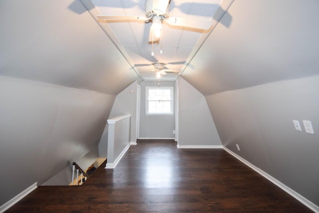 bonus room with dark hardwood / wood-style flooring, vaulted ceiling, and ceiling fan