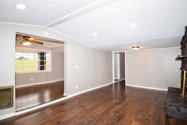 unfurnished living room featuring a stone fireplace, vaulted ceiling, ornamental molding, baseboard heating, and dark hardwood / wood-style flooring