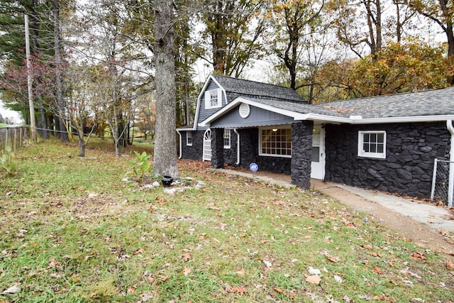 view of home's exterior featuring a lawn