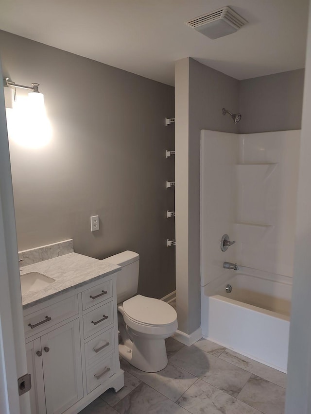 full bathroom featuring vanity, shower / tub combination, and toilet