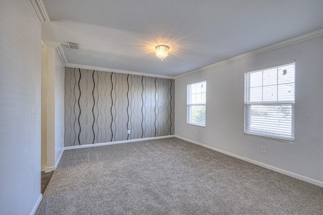 carpeted empty room with crown molding