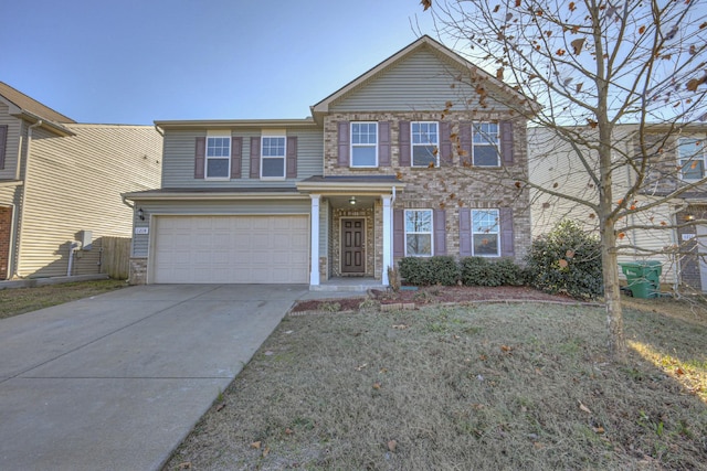 view of front of property featuring a garage