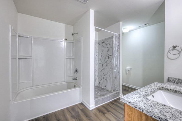 bathroom with hardwood / wood-style floors and vanity