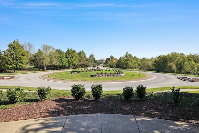 surrounding community featuring a yard