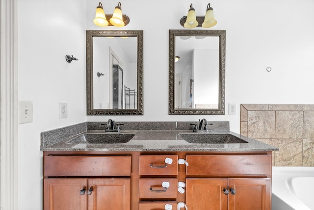 bathroom featuring vanity and a bathing tub