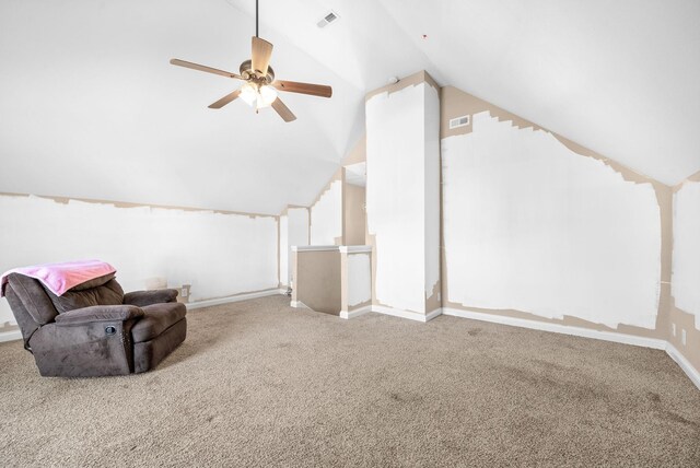 additional living space featuring carpet flooring, ceiling fan, and vaulted ceiling