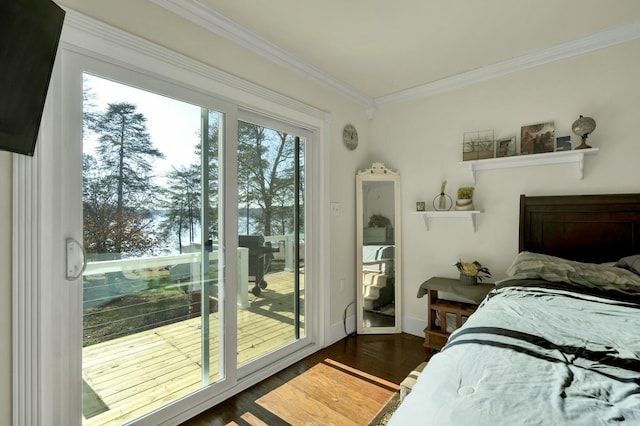 bedroom featuring access to outside, crown molding, and dark hardwood / wood-style floors