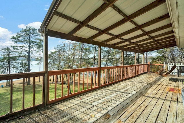 wooden terrace with a yard