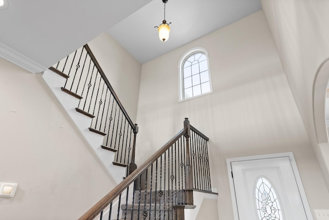 stairs with a towering ceiling