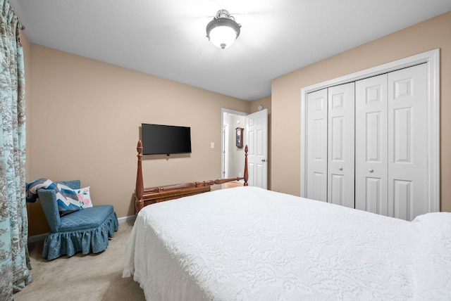 carpeted bedroom with a closet