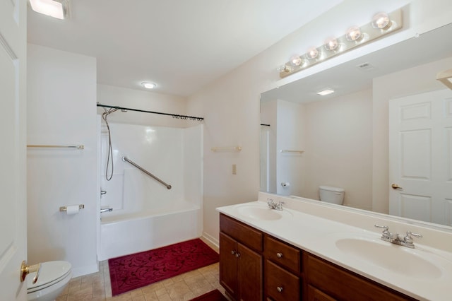 full bathroom featuring bathing tub / shower combination, vanity, and toilet