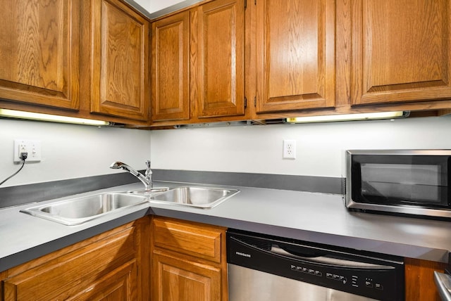 kitchen with appliances with stainless steel finishes and sink