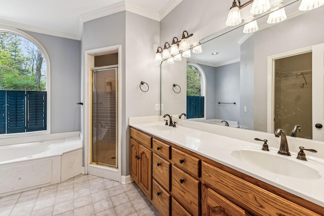 bathroom featuring plus walk in shower, crown molding, and a wealth of natural light