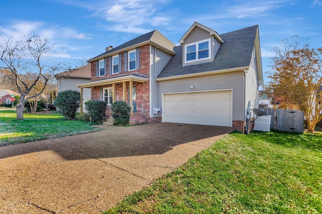 view of front of property featuring a garage and a front lawn