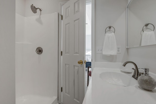 bathroom with a shower and sink