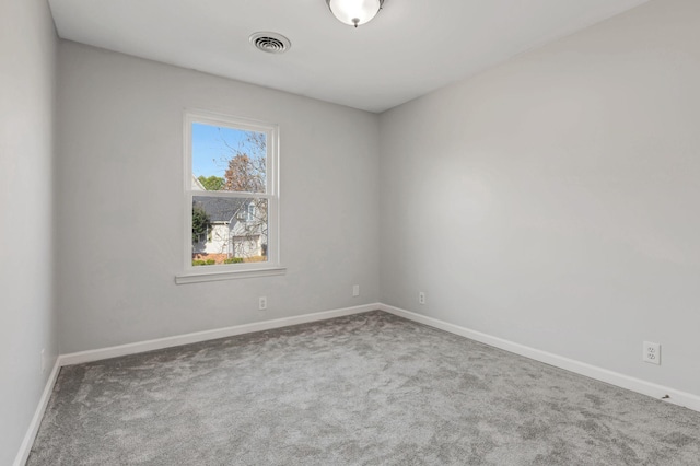 spare room with carpet flooring