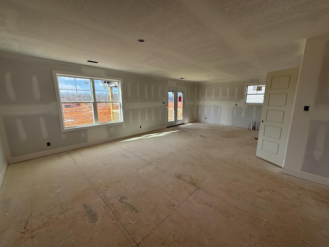 empty room featuring a wealth of natural light