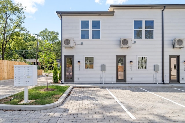 view of front of house featuring ac unit