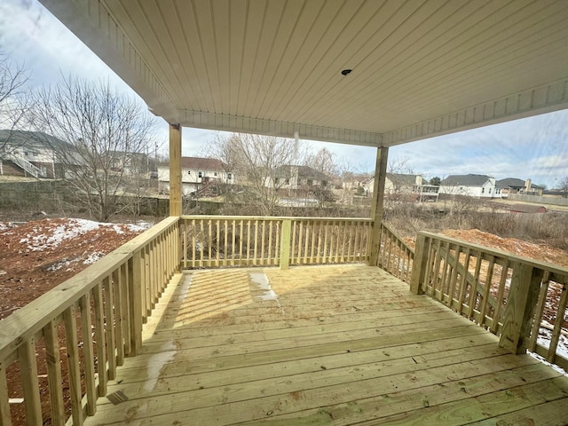 view of snow covered deck