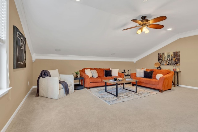 living room featuring lofted ceiling, light colored carpet, ceiling fan, and ornamental molding