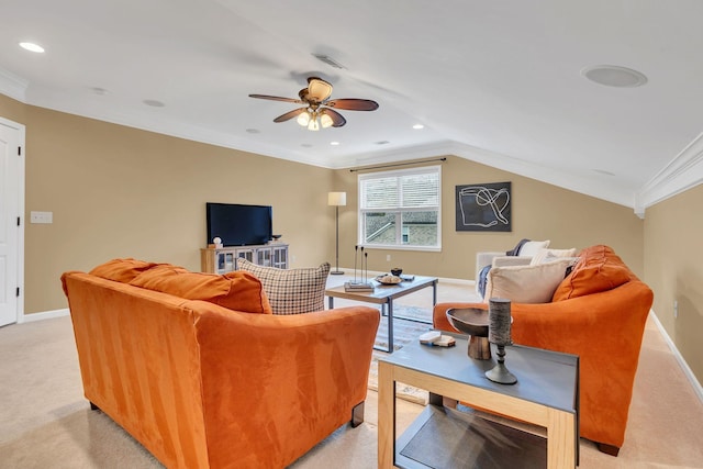 living room with ceiling fan, light colored carpet, vaulted ceiling, and ornamental molding