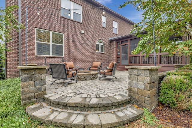 view of patio / terrace with a fire pit