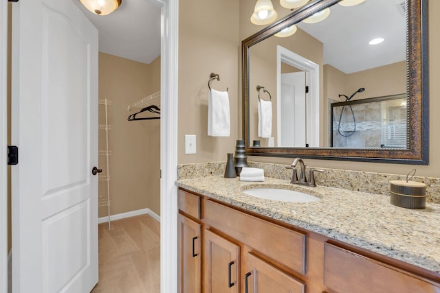 bathroom featuring vanity and walk in shower