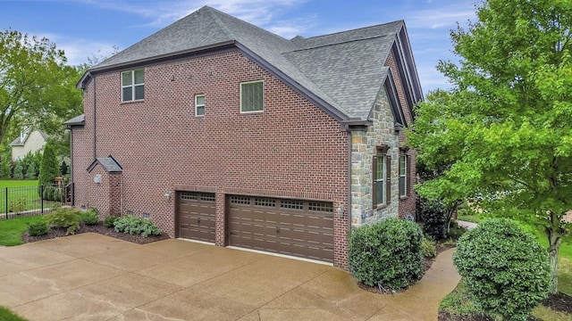 view of home's exterior with a garage