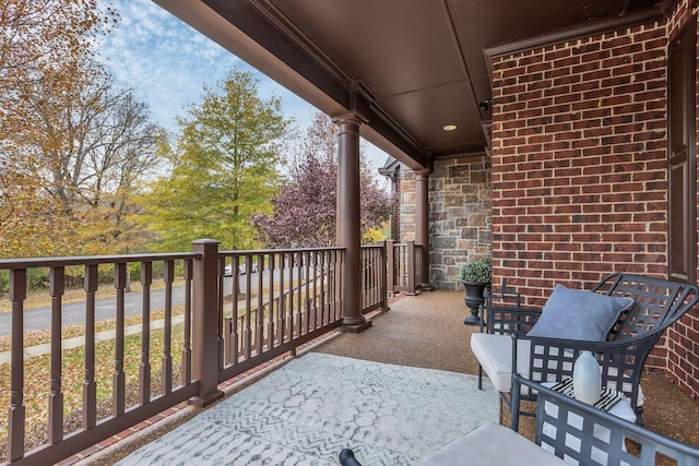 view of patio / terrace featuring a balcony